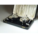 A cased pair of silver sauce boats and spoons, Emile Viner, Sheffield 1941 & 1945,