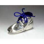 An Edwardian novelty silver pin cushion in the form of a shoe, Levi & Salaman, Birmingham 1906, 8.