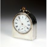 A silver cased bedside timepiece, FGP, Birmingham 1997, of plain polished arched form, 7.