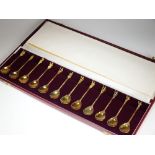 A cased set of twelve silver gilt spoons 'The Tichborne Celebrities' Collection, B M, London 1978,