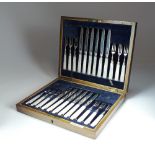 A cased set of twenty-four silver fruit knives and forks, Mappin & Webb, Sheffield 1918,