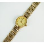A Lady's 9ct gold Rotary bracelet watch, the oval champagne dial with batons,