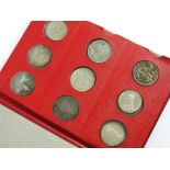 Red Coin Library album, containing fifty-six British coins,