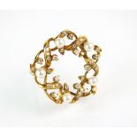 An 18ct gold diamond and cultured pearl wreath brooch,