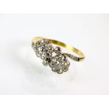 A floral diamond cluster ring,