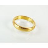 A 22ct gold plain polished wedding band, ring size M, weight 5.