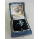 A turquoise and pearl navette shaped cluster ring