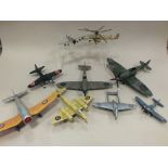 A group of unboxed model aircraft in various scales and materials also to include five boxed small