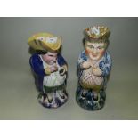 Two 19th century toby jugs modelled as characters taking snuff