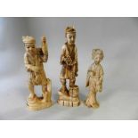 Three Japanese carved ivory okimono, a fisherman,