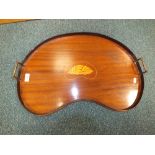 An Edwardian mahogany and boxwood inlaid kidney shaped tray with conch shell motif,