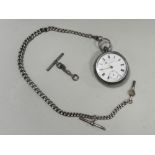 A silver open face pocket watch with attached silver Albert
