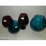 Twelve 20th century large decorative coloured glass table centrepieces