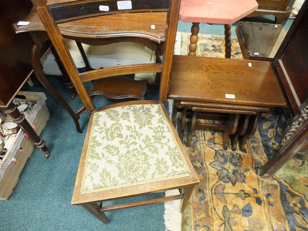 An Edwardian mahogany and boxwood strung bedroom chair, a modern nest of three oak tables,