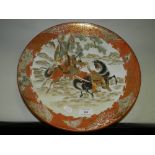 A Japanese Kutani charger late 19th/early 20th century decorated with a scene of two warriors