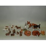 Beswick animals: 4 hunting hounds, 3 foxes,