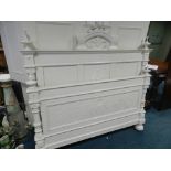 A white painted Art Nouveau head and foot board with cresting,