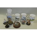 Collectable ceramics including a set of RAF commemorative mugs and a group of cast resin animal