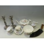 A florally decorated early 20th century partial tea service,