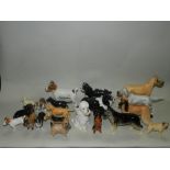 A quantity of Beswick models of dogs to include King Charles spaniels, border Collies, Labradors,