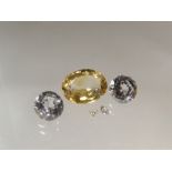 Two loose old cut diamonds together with an oval faceted citrine and two faceted round mixed cut