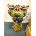 A Doulton Lambeth stoneware jardiniere and stand of faience type,