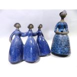 Two Swedish pottery figures by Jie Gantofta, the first modelled as a lady in dress,