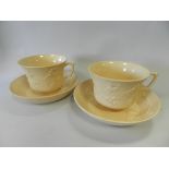 A pair of Wedgwood smear glazed drab ware breakfast cups and saucers,