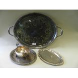 An electroplated oval twin handled tray together with two small oval trays and a sauce boat