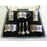A cased set of five silver cruets comprising two salts,
