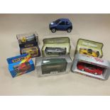 A mixed collection of boxed die cast cars, the majority by Lledo,