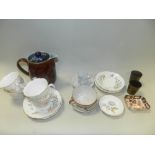 A pair of engraved brass miniature tumblers, a Royal Crown Derby Imari pin dish (repaired),