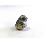 A silver mounted pin cushion in the form of a chick hallmarked Chester