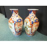 A pair of Japanese Imari vases