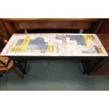 A Formica topped coffee table with design in the manner of John Piper of a coloured London