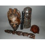 20th century Africa tribal masks and two carved figures