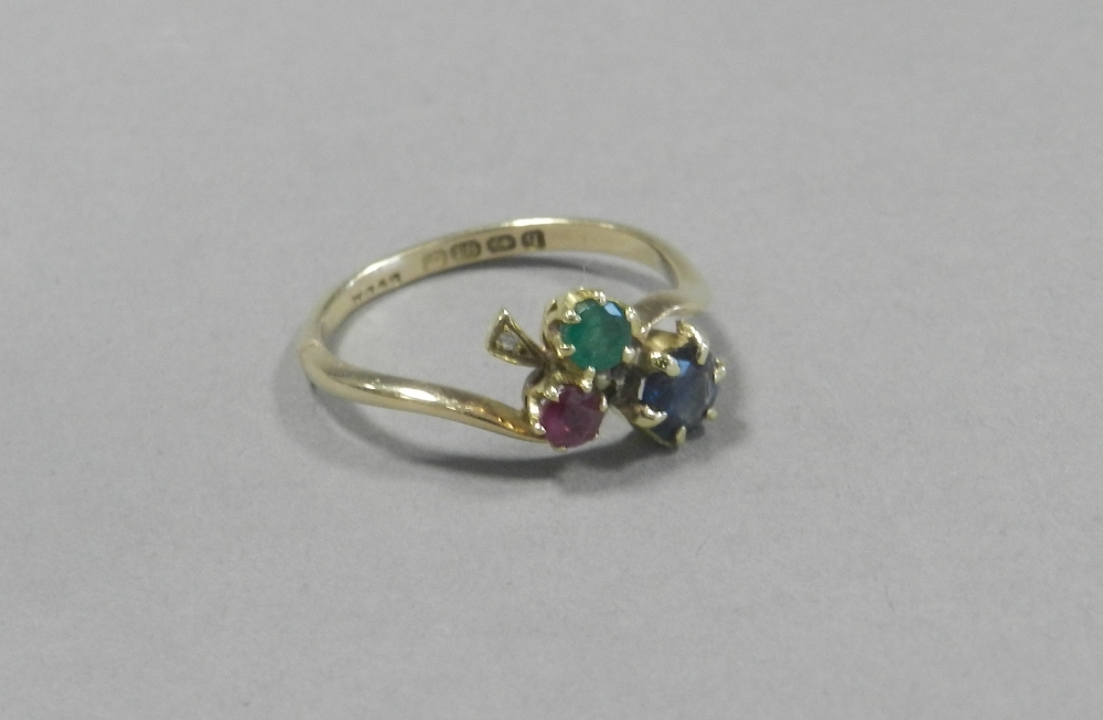 An 18ct gold sapphire, ruby,