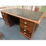 A mahogany pedestal office desk with seven pedestal drawers, 183cm wide,