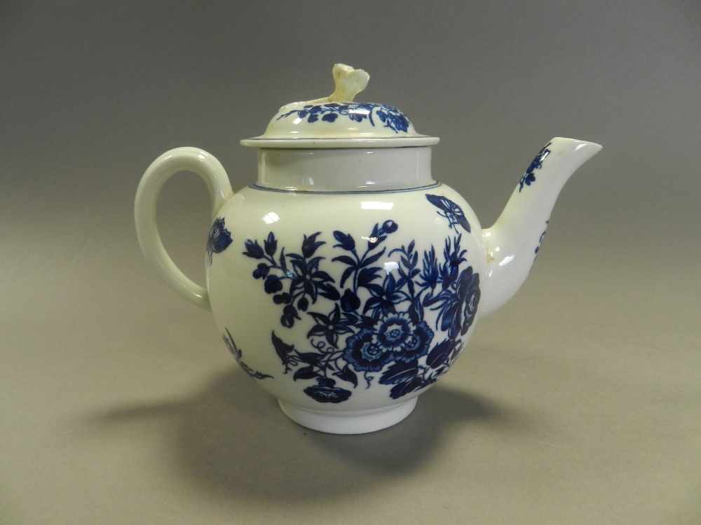 A Worcester porcelain teapot and cover transfer printed in the three flowers pattern (cracked)