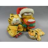 A box of Garfield related soft toys