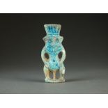 An Egyptian pottery votive figure or amulet of Bes, Ptolomaic (332-30 BC),