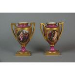 A pair of small Vienna style twin-handled vases painted with Classical panels,