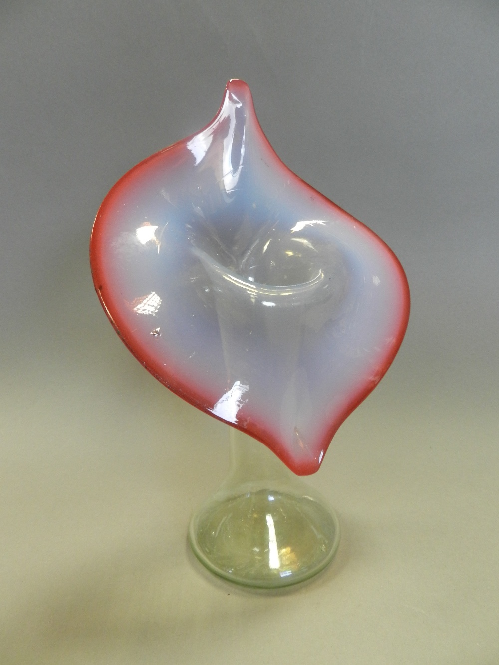 A cranberry and vaseline glass Jack in the Pulpit vase,