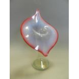 A cranberry and vaseline glass Jack in the Pulpit vase,