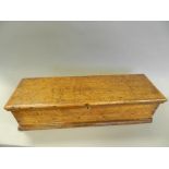 An early 20th century oak box with hinged lid and brass key escutcheon together with opalescent