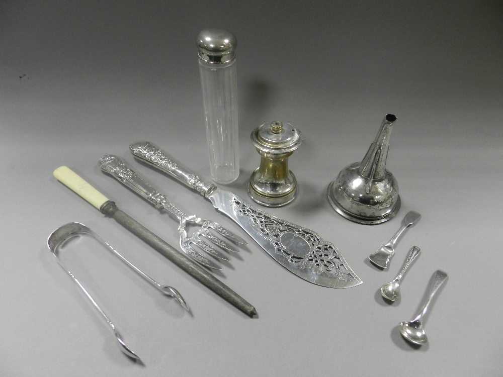 A silver fish server and fork together with a pair of silver sugar tongs,