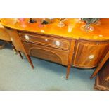 A George III style satinwood crossbanded mahogany D-shaped breakfront sideboard with central frieze