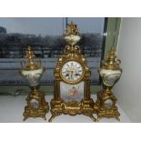 A French ormolu and porcelain clock garniture of Empire style,