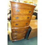 A Reprodux Bevan Funnell Ltd figured walnut bow front chest on chest of six graduated drawers on