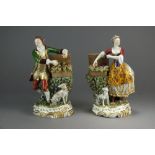 A pair of French porcelain figures in the Derby style of male and female fruit vendors,